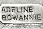 Adeline Bowannie Zuni hallmark on a plate